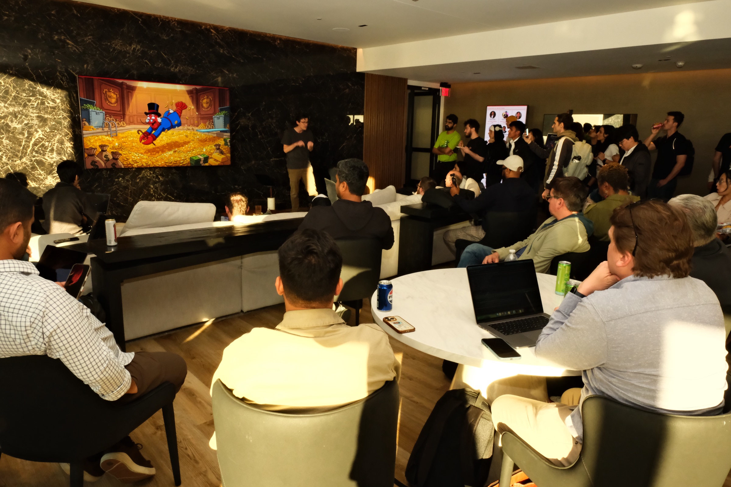 Andrew Smith presenting to the crowd at The Penthouse Heist